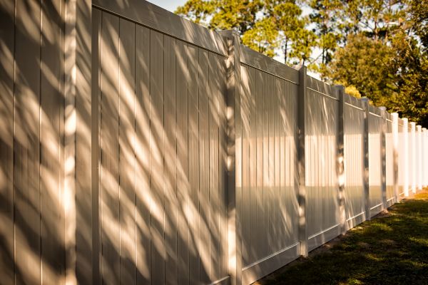 Tan Vinyl Fence Installation in Conway