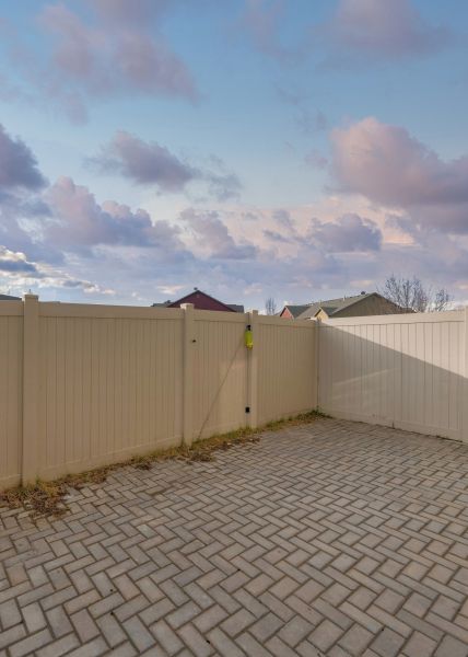 Tan PVC Fence Installation in Conway